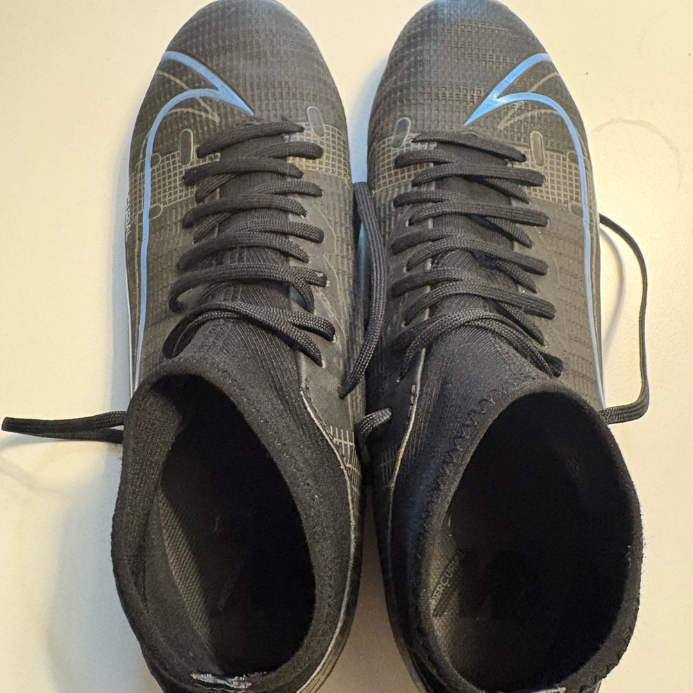 Men's Black Athletic Soccer Shoes with Light Blue Accents
